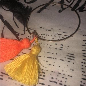 gold bangle with tassel